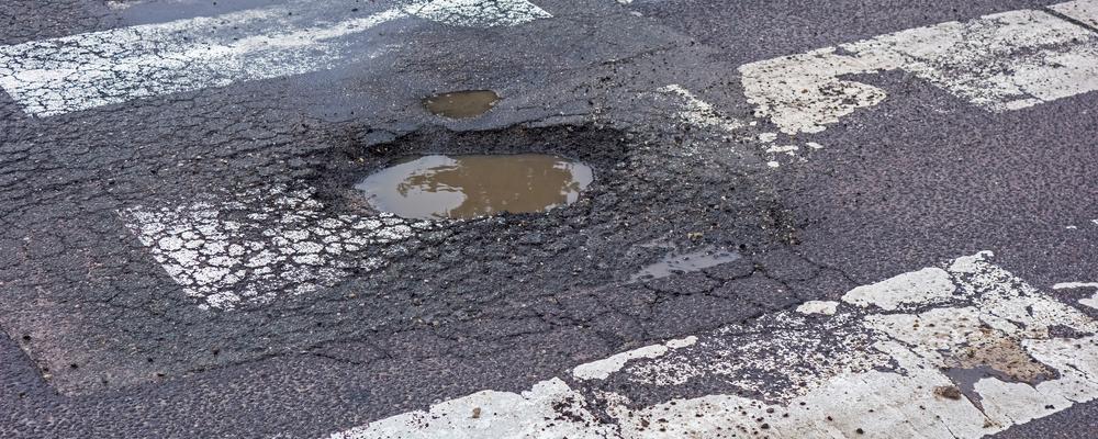 Quincy pothole injury liability lawyer